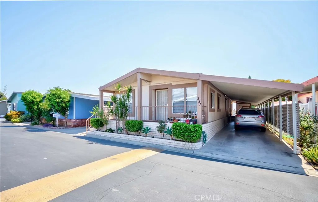 1051 Site, Unit 231 Brea, CA 92821 - Photo 2 of 34 a view of a house with a street