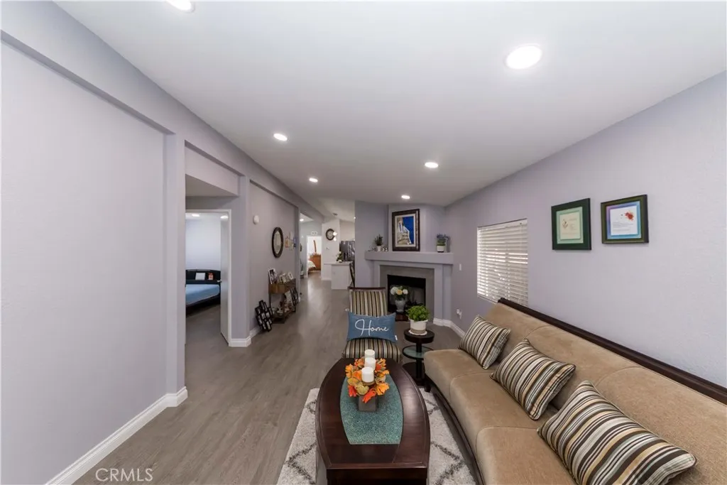 1051 Site, Unit 231 Brea, CA 92821 - Photo 28 of 34 a living room with furniture and a fireplace