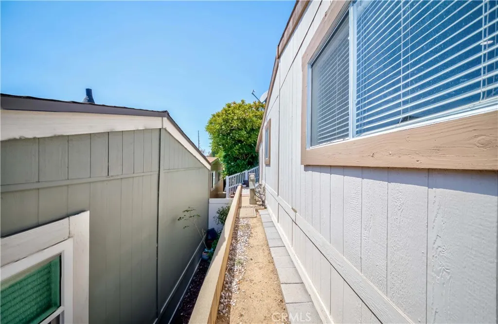 1051 Site, Unit 231 Brea, CA 92821 - Photo 7 of 34 a view of a balcony with wooden floor and fence