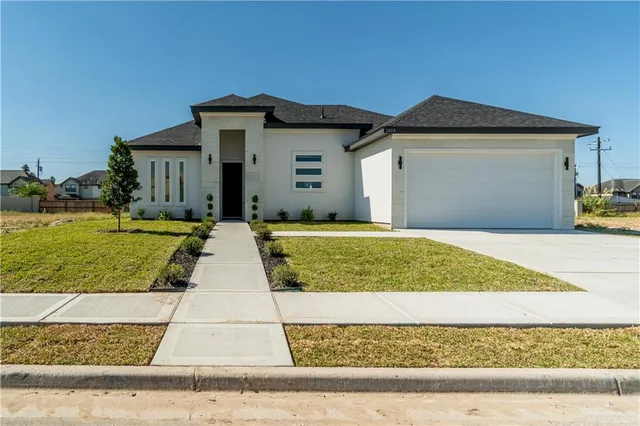 a view of outdoor space yard and front view of a house