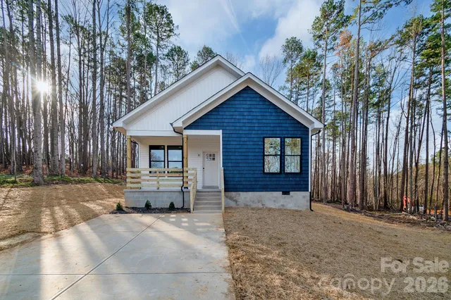 a view of a house with sitting area and garage
