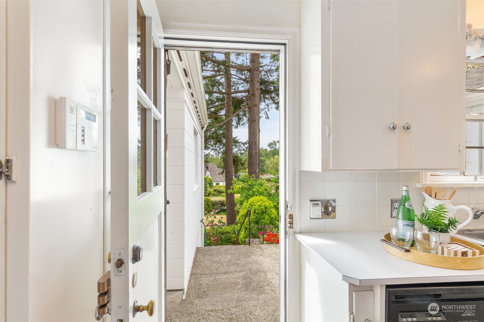 5625 Northeast Windermere Road Seattle, WA 98105 - Photo 15 of 40 a view of hallway with furniture and garden
