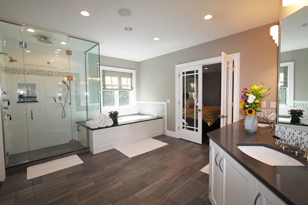 54 Monarch Path Groton, MA 01450 - Photo 12 of 29 a living room with kitchen island granite countertop wooden floor and stainless steel appliances
