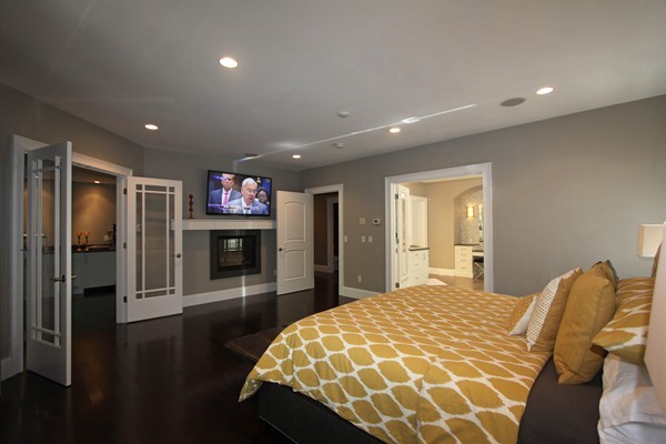 54 Monarch Path Groton, MA 01450 - Photo 16 of 29 a spacious bedroom with a bed and a television