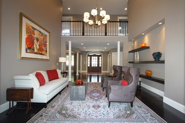 54 Monarch Path Groton, MA 01450 - Photo 19 of 29 a living room with furniture chandelier and a couch