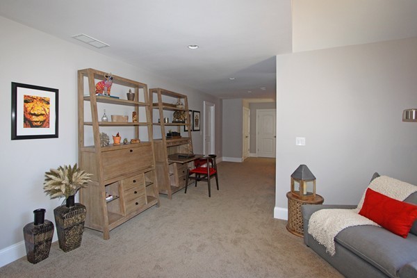 54 Monarch Path Groton, MA 01450 - Photo 23 of 29 a living room with furniture