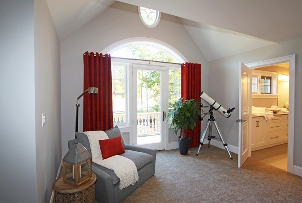 54 Monarch Path Groton, MA 01450 - Photo 24 of 29 a living room with furniture and a large window