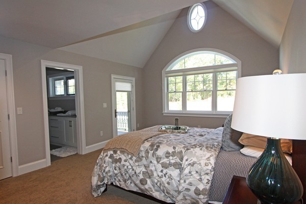 54 Monarch Path Groton, MA 01450 - Photo 25 of 29 a bedroom with a bed and a window