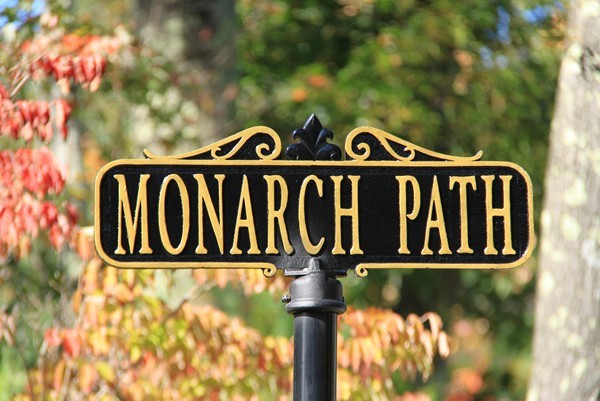 54 Monarch Path Groton, MA 01450 - Photo 29 of 29 a street sign that is on a pole