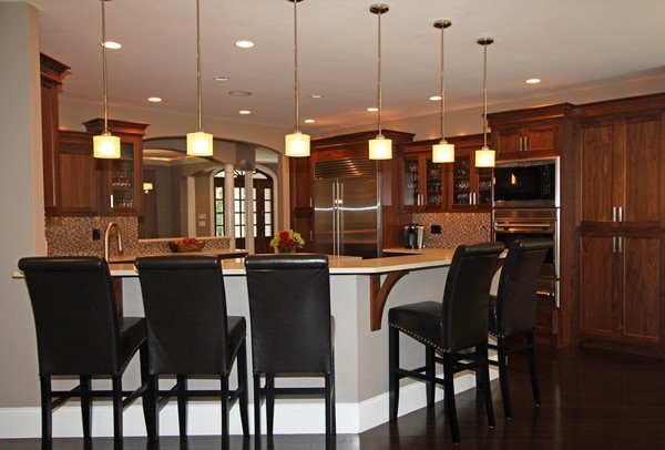 54 Monarch Path Groton, MA 01450 - Photo 5 of 29 a dining area with a table chairs and a kitchen view