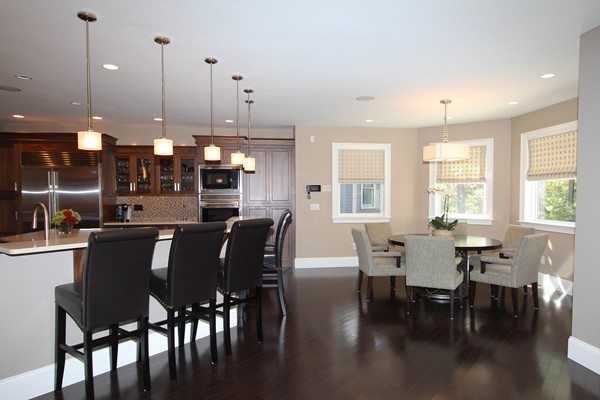 54 Monarch Path Groton, MA 01450 - Photo 6 of 29 a dining room with stainless steel appliances kitchen island granite countertop a dining table chairs and view living room