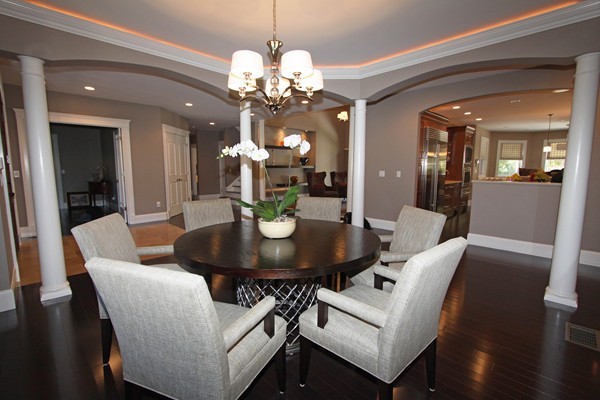 54 Monarch Path Groton, MA 01450 - Photo 7 of 29 a view of a dining room with furniture and wooden floor