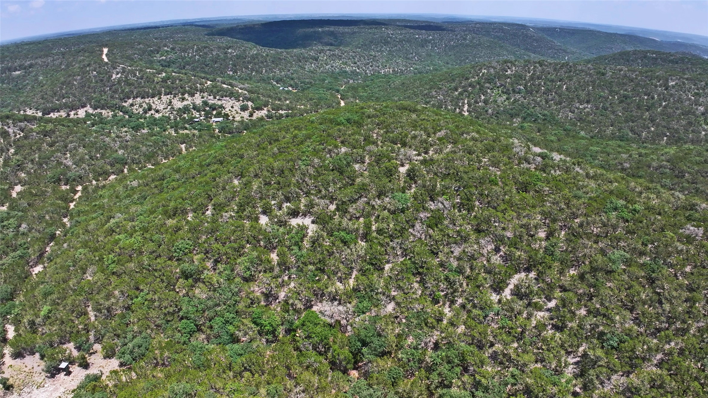 Lot 129 Spring Country Ranch Road Leakey, TX 78873 - Photo 5 of 19 a view of a field with an ocean