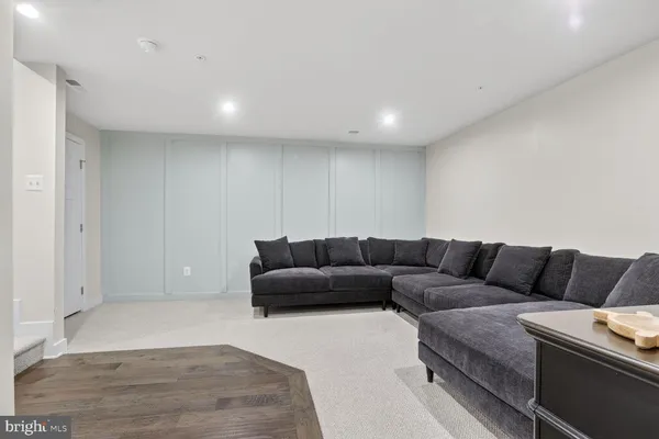 a living room with furniture and a couch
