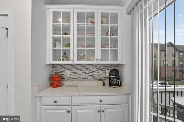 a bathroom with a sink and a window