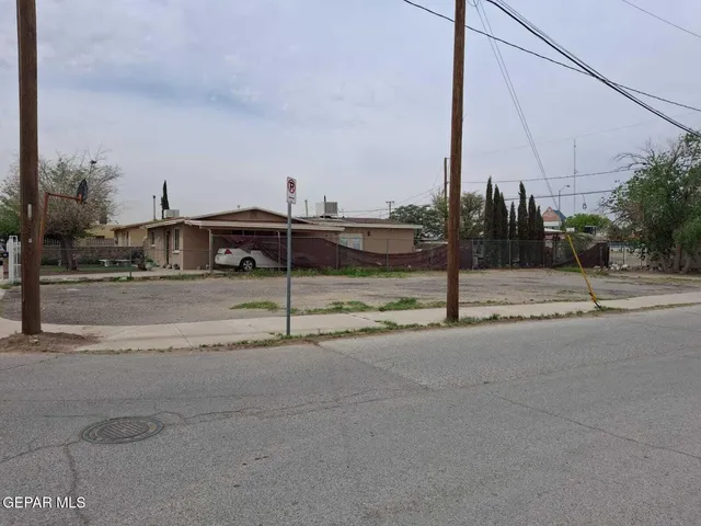 a view of a street with houses