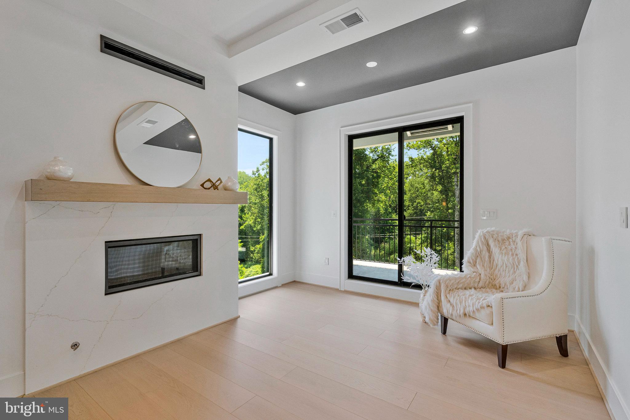 1434 Waggaman Circle McLean, VA 22101 - Photo 44 of 113 sleek gas fireplace adds warmth and ambiance