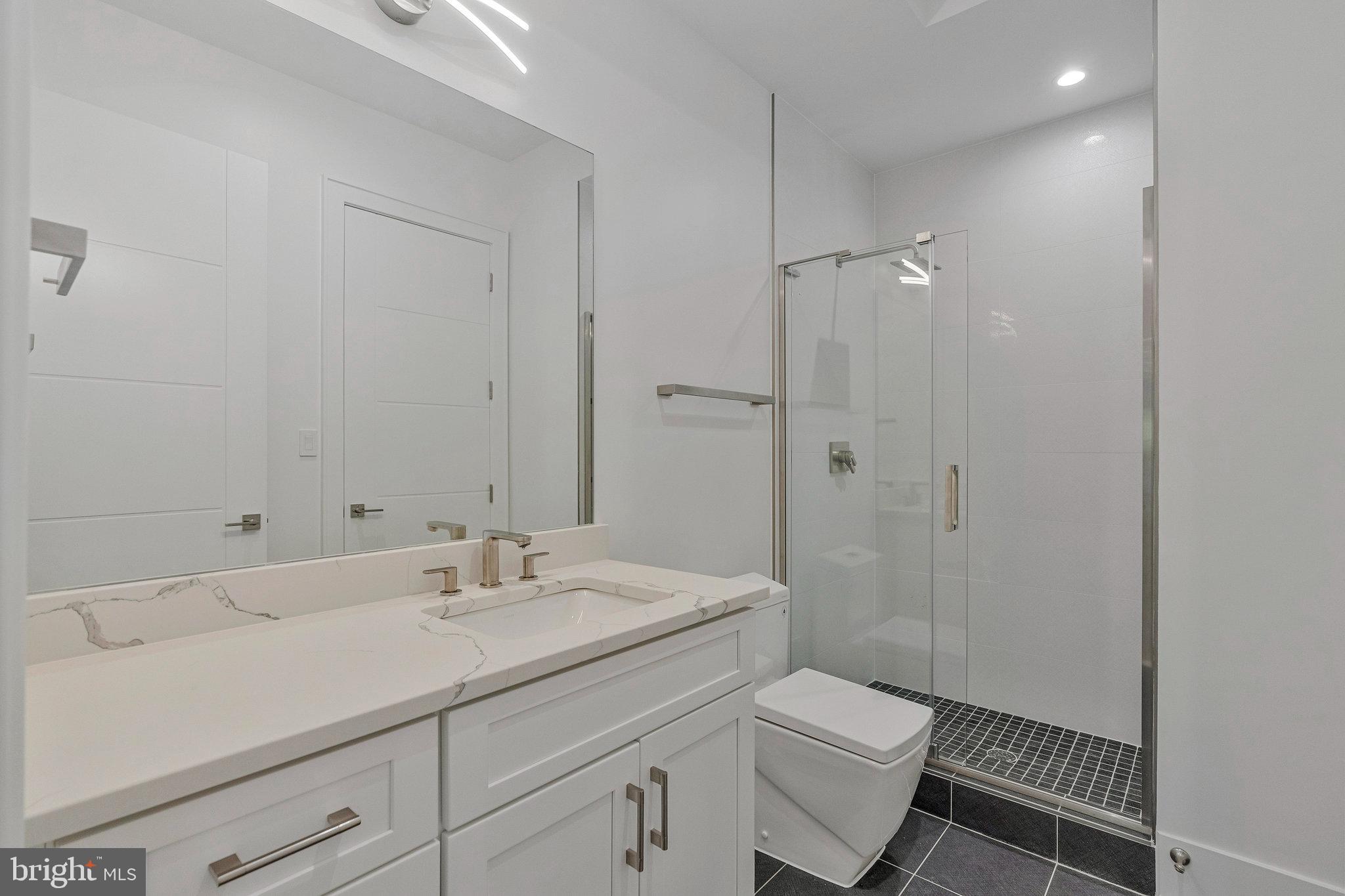 1434 Waggaman Circle McLean, VA 22101 - Photo 95 of 113 Lower level bedroom w/ full bath