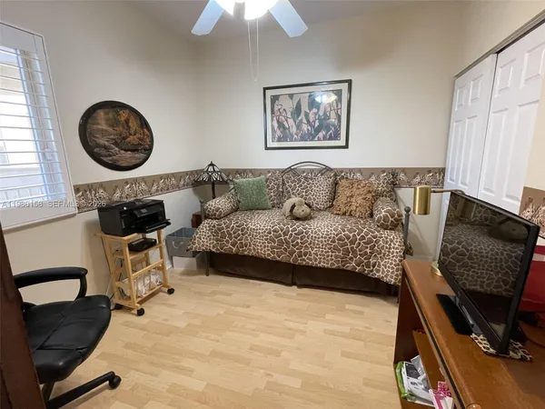 a living room with furniture and a window