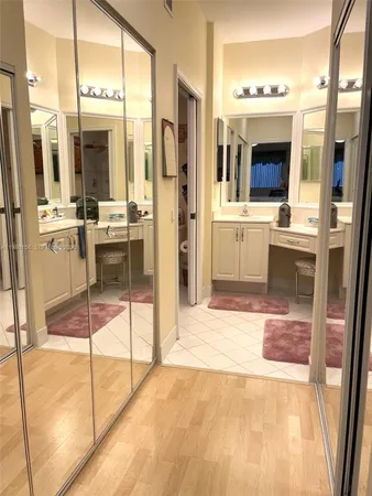 a lobby with furniture and floor to ceiling window