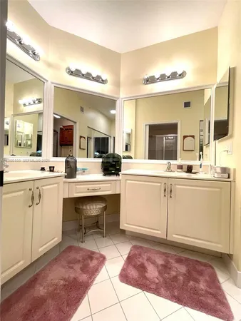 a bathroom with a tub and a shower