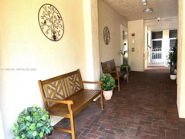 a view of a hallway with entryway