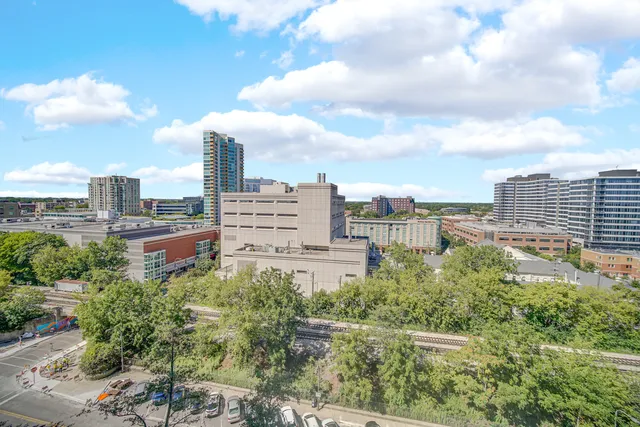 a view of a city with tall buildings