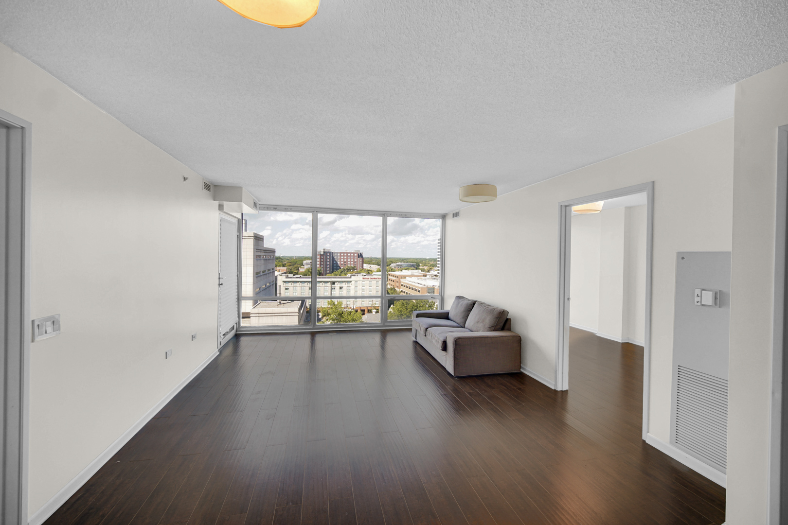800 Elgin Road, Unit 1210 Evanston, IL 60201 - Photo 6 of 20 a living room with furniture and a table