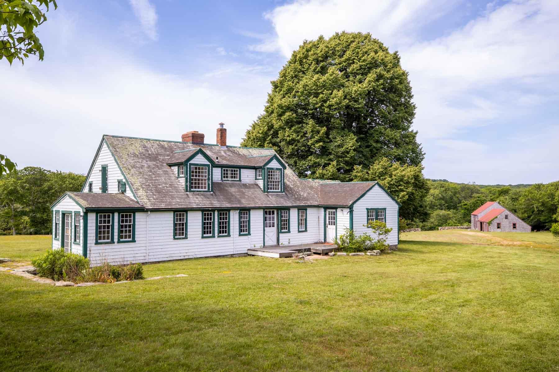 277 N Road Chilmark, MA 02535 - Photo 3 of 14 a front view of a house with swimming pool