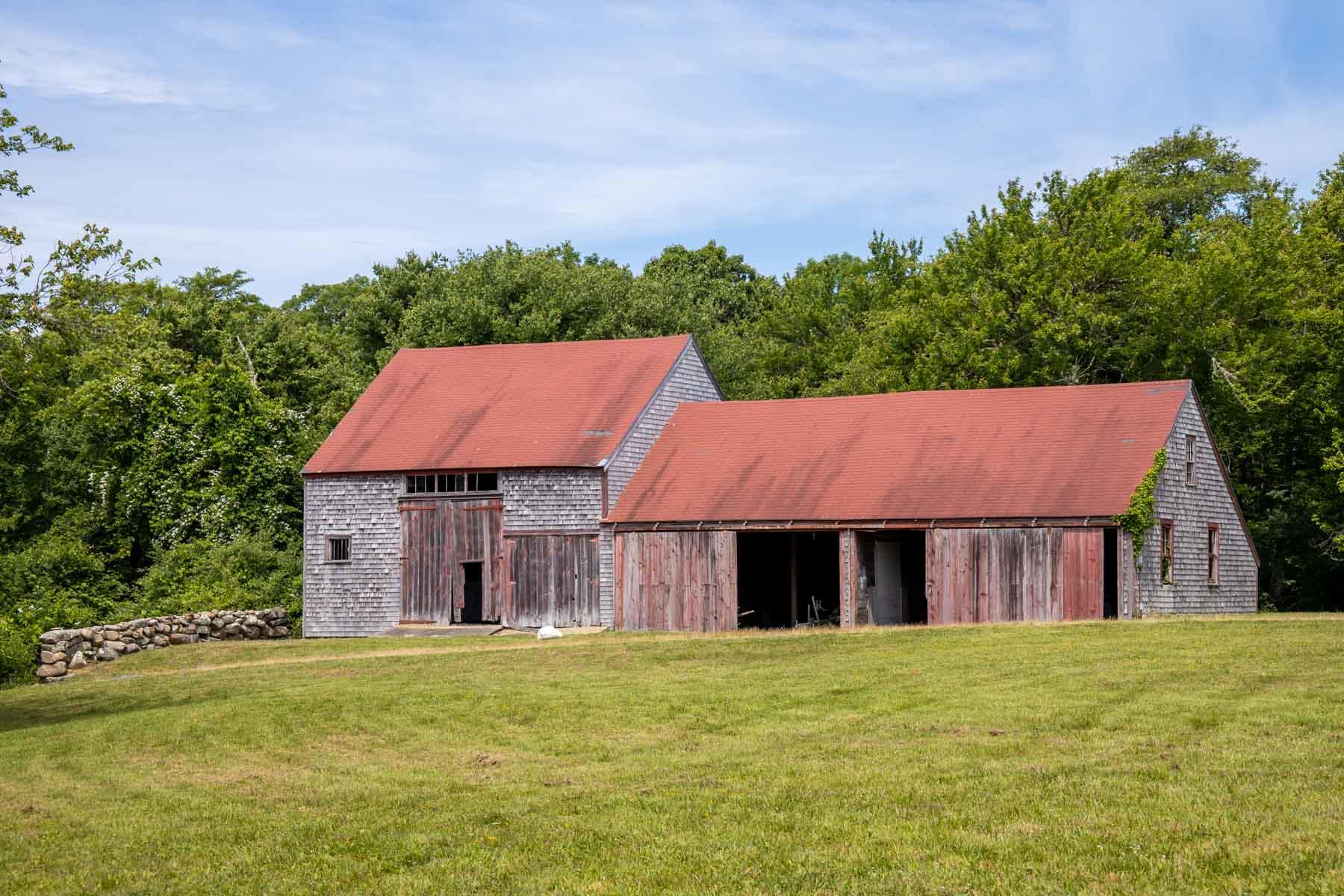 277 N Road Chilmark, MA 02535 - Photo 5 of 14 a front view of a house with a garden
