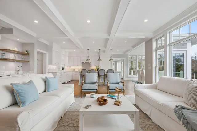 a bathroom with a double vanity sink toilet and shower