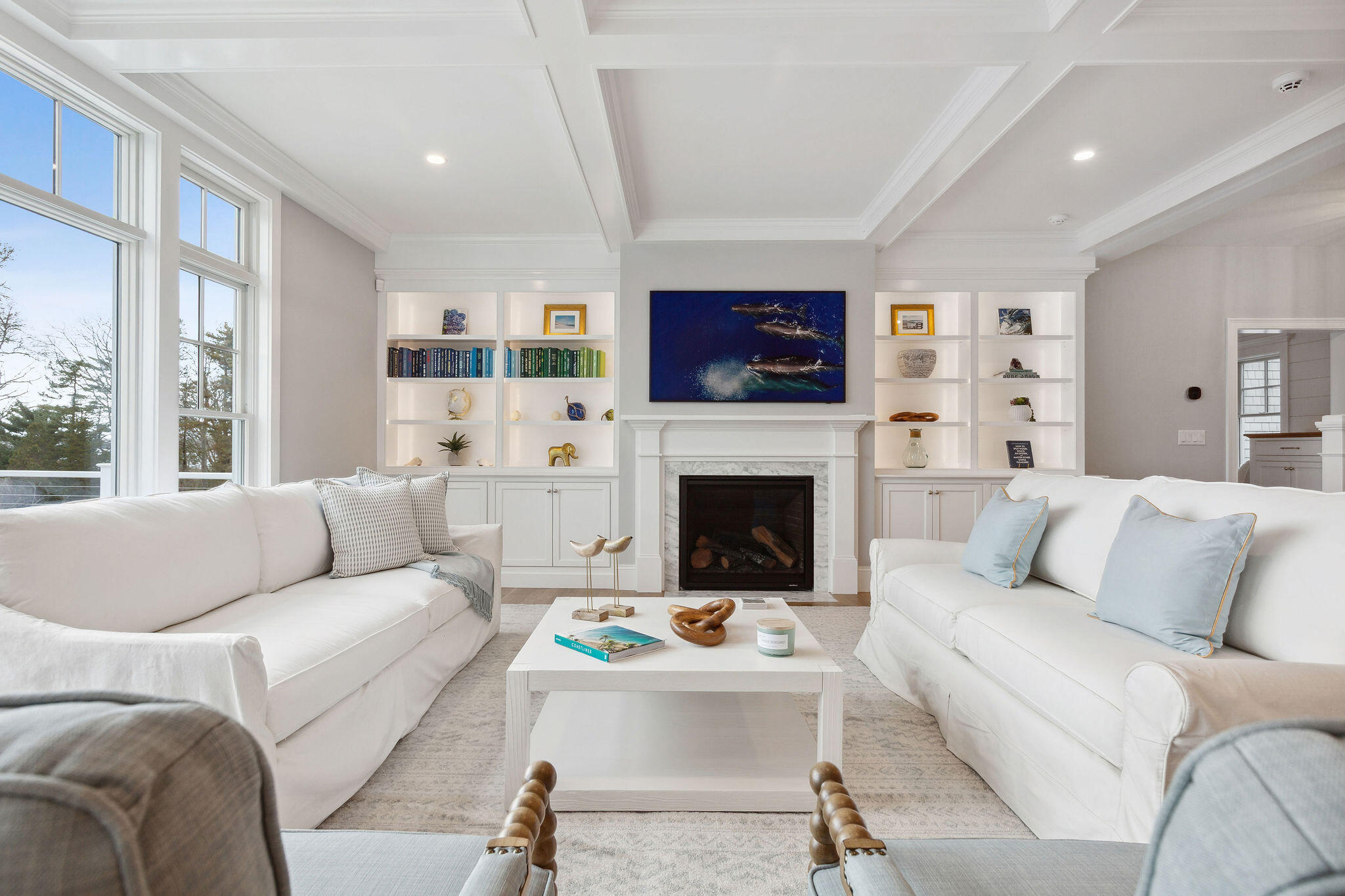 44 Tonset Road Orleans, MA 02653 - Photo 19 of 79 a living room with furniture and a fireplace