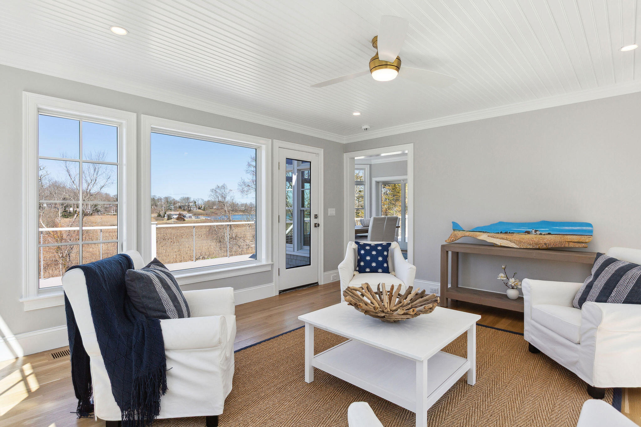 44 Tonset Road Orleans, MA 02653 - Photo 31 of 79 a living room with furniture and a large window