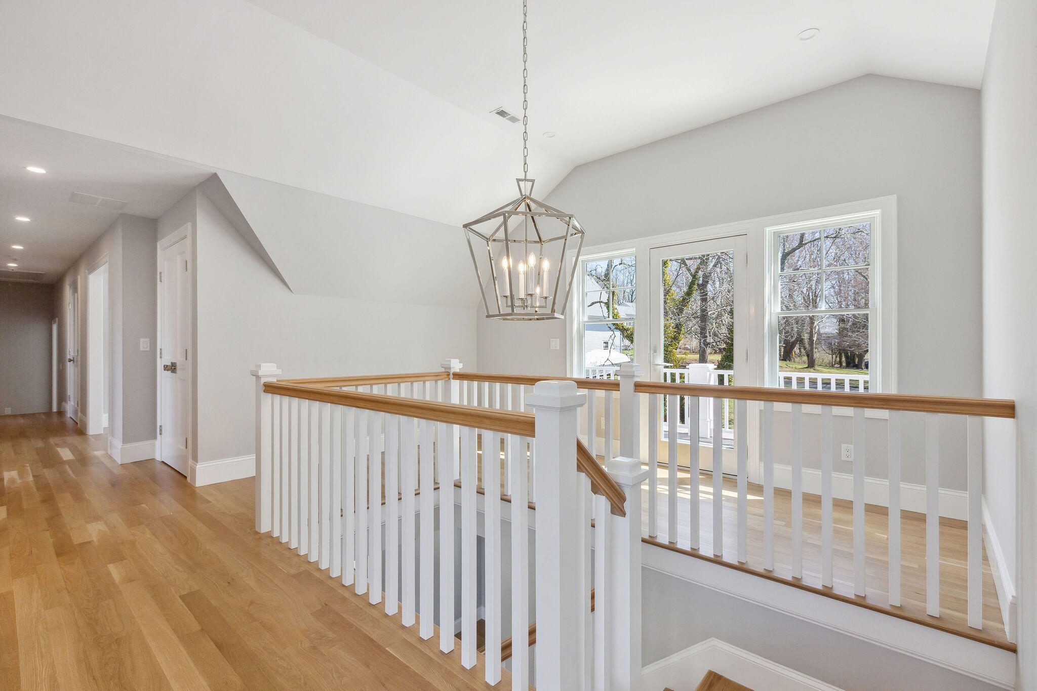 44 Tonset Road Orleans, MA 02653 - Photo 38 of 79 a view of a room with wooden floor windows and stairs