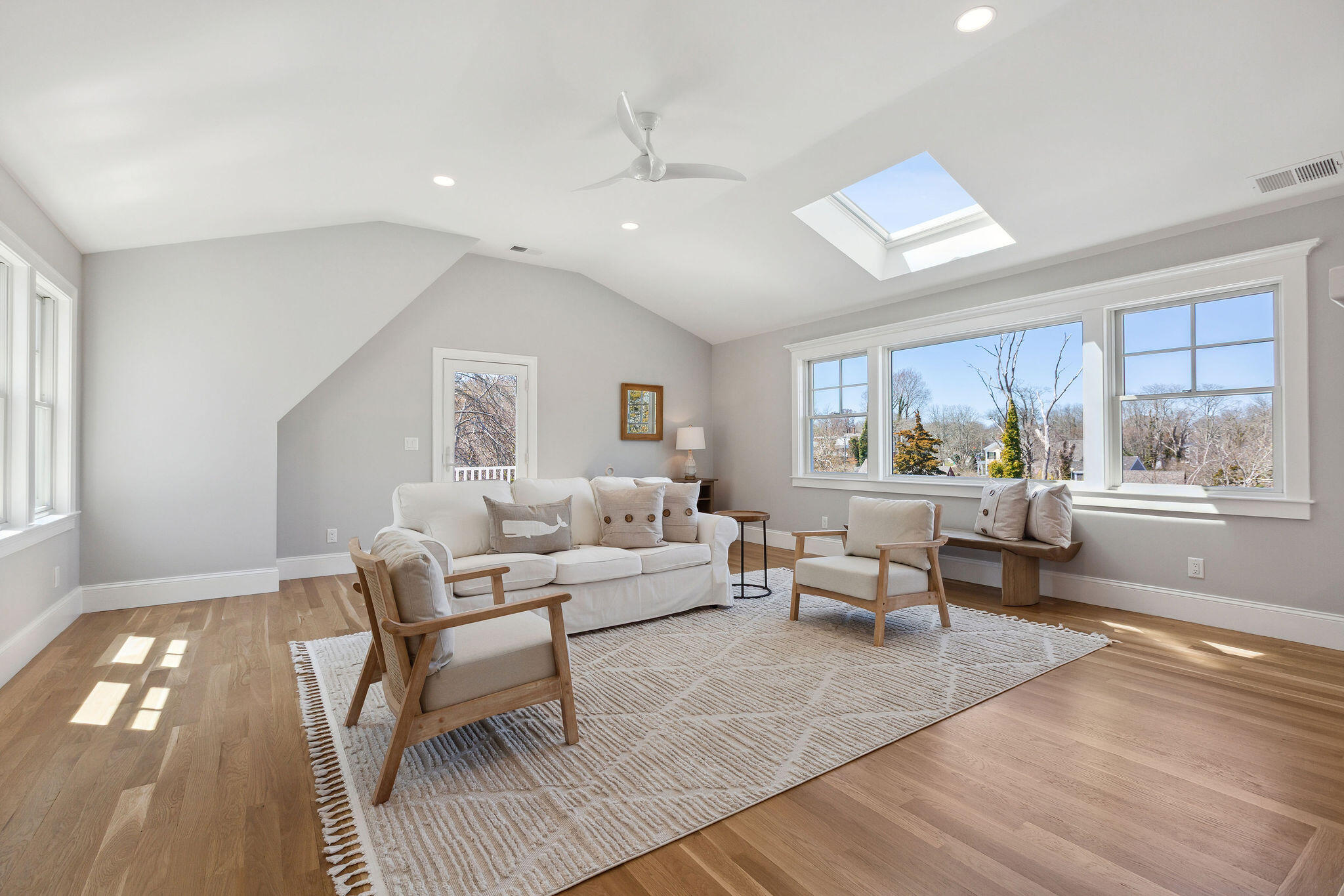 44 Tonset Road Orleans, MA 02653 - Photo 40 of 79 a living room with furniture and a large window