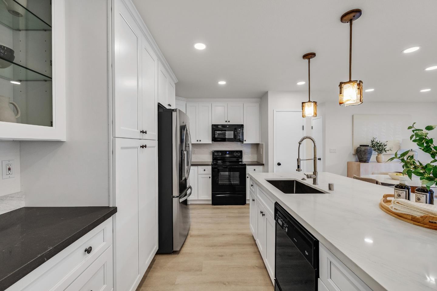 205 Red Oak Drive, Unit M Sunnyvale, CA 94086 - Photo 13 of 32 a kitchen with stainless steel appliances granite countertop a sink a stove and a refrigerator