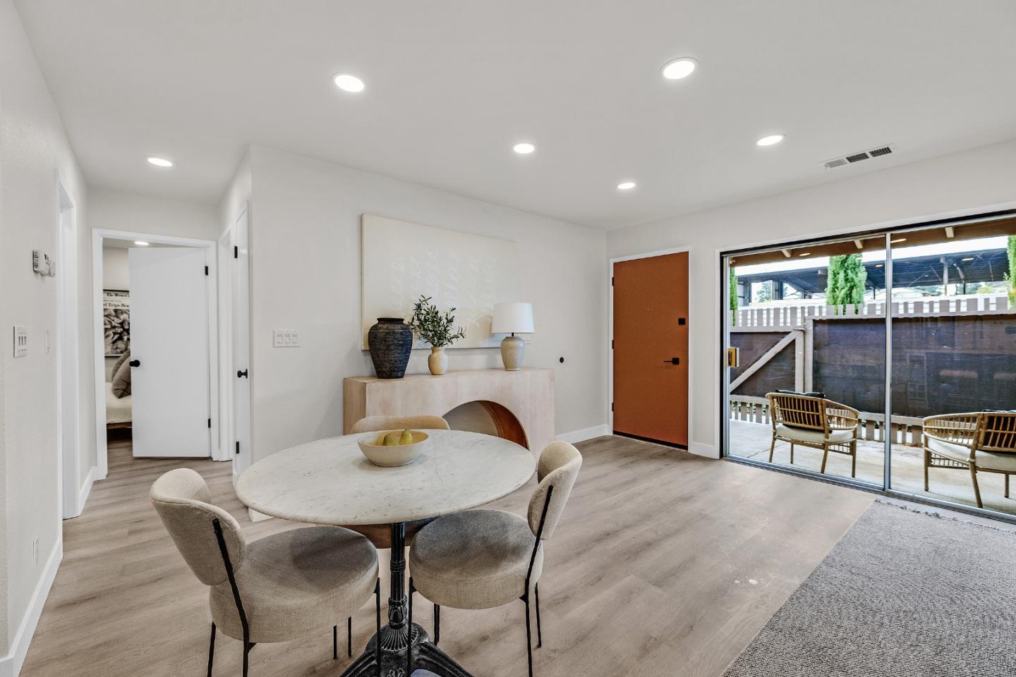 205 Red Oak Drive, Unit M Sunnyvale, CA 94086 - Photo 15 of 32 a view of a dining room with furniture and chandelier