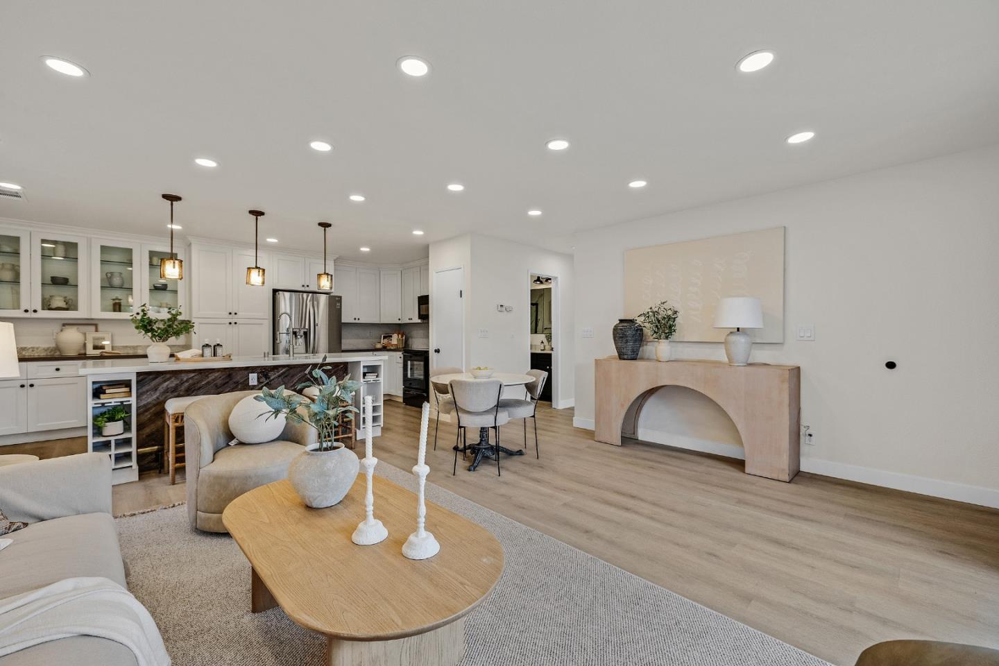 205 Red Oak Drive, Unit M Sunnyvale, CA 94086 - Photo 8 of 32 a living room with furniture a fireplace and kitchen view