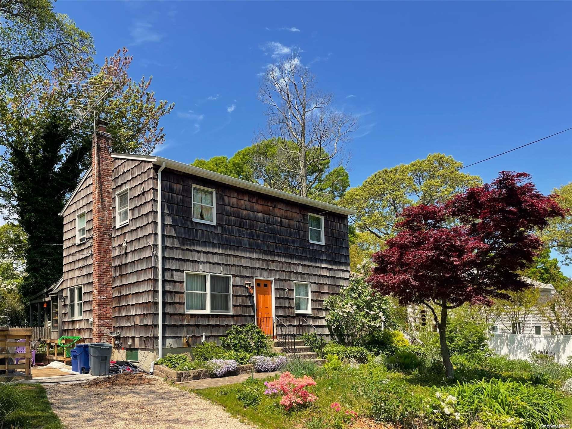 a view of a house with a street