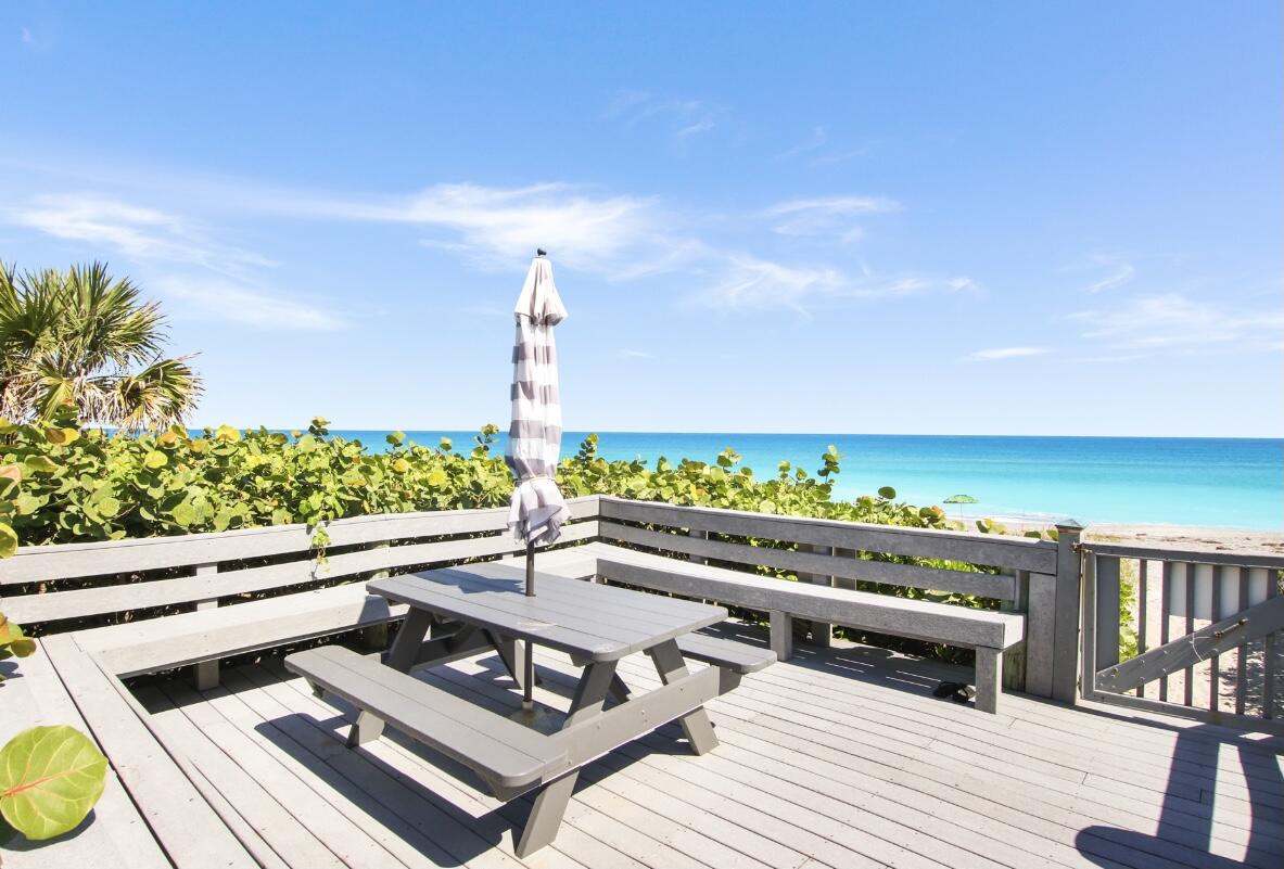 420 Celestial Way, Unit 301 Juno Beach, FL 33408 - Photo 11 of 51 a view of a terrace with chairs