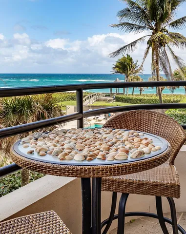a view of a ocean from a balcony