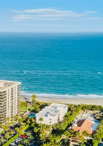 a kitchen with cabinets a sink and appliances