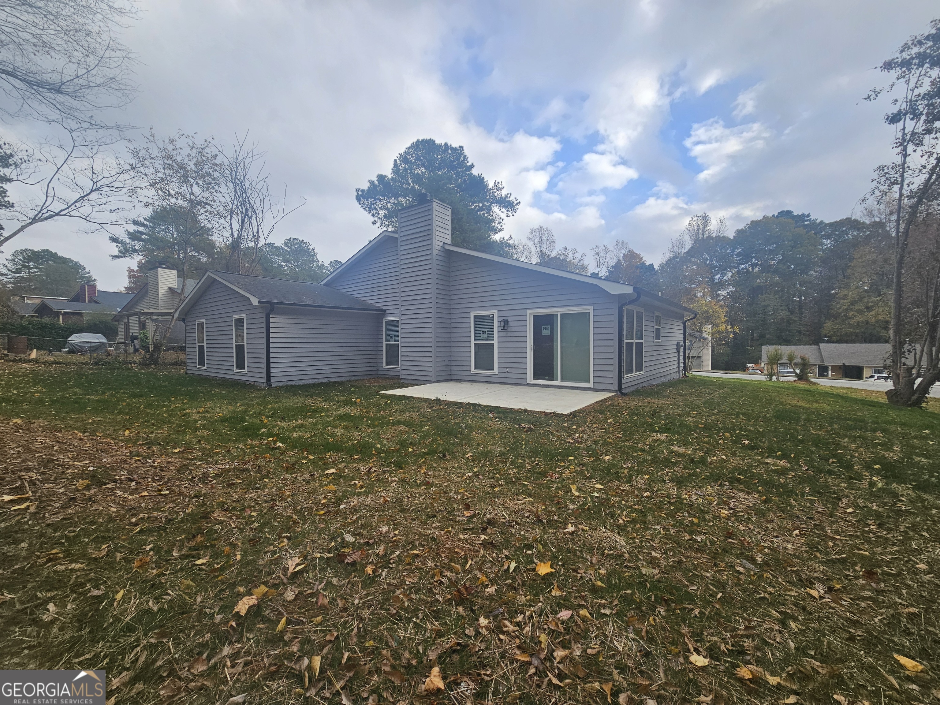 391 Park Ridge Circle Riverdale, GA 30274 - Photo 11 of 42 a house view with a garden space