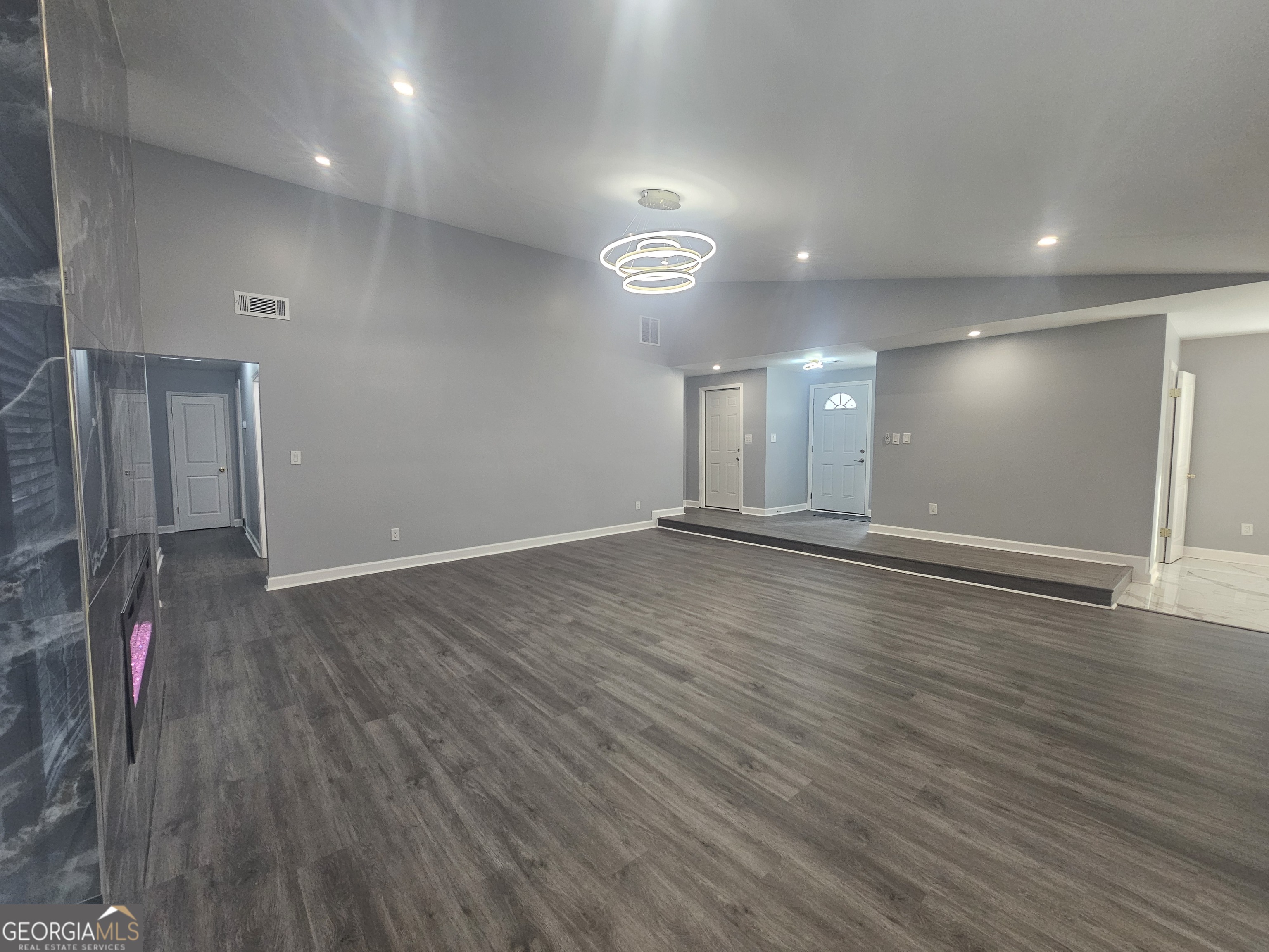 391 Park Ridge Circle Riverdale, GA 30274 - Photo 17 of 42 a view of a room with wooden floor