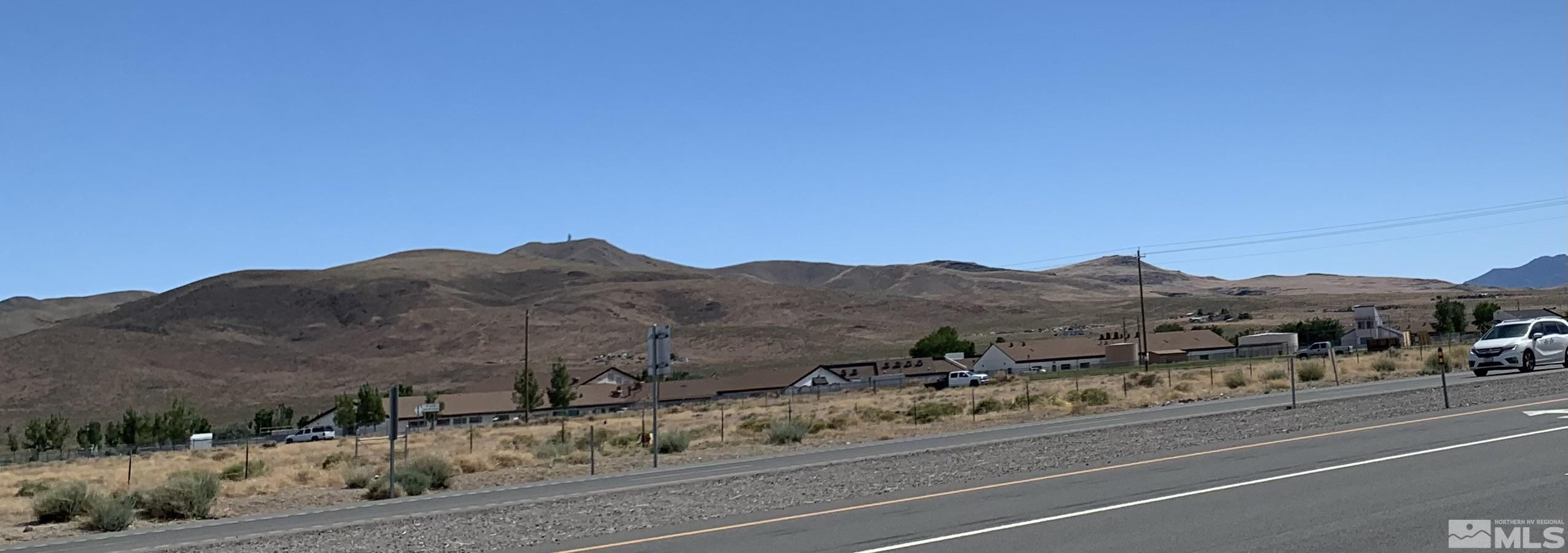 3845 Highway 50 Silver Springs, NV 89429 - Photo 1 of 1 a view of a town with mountains in the background