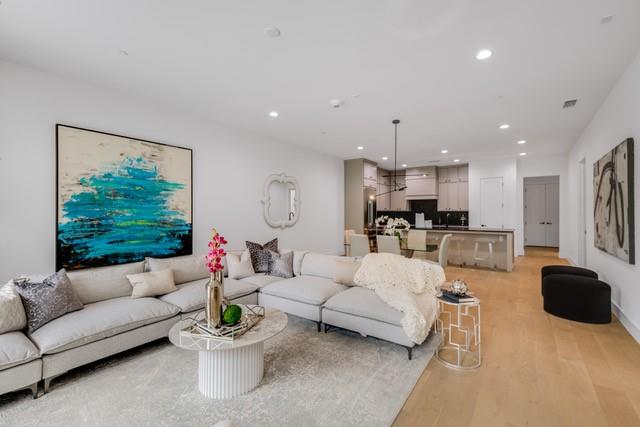 3601 Routh Street, Unit 2E Dallas, TX 75219 - Photo 4 of 14 Living room with visible vents, light wood-style flooring, and recessed lighting