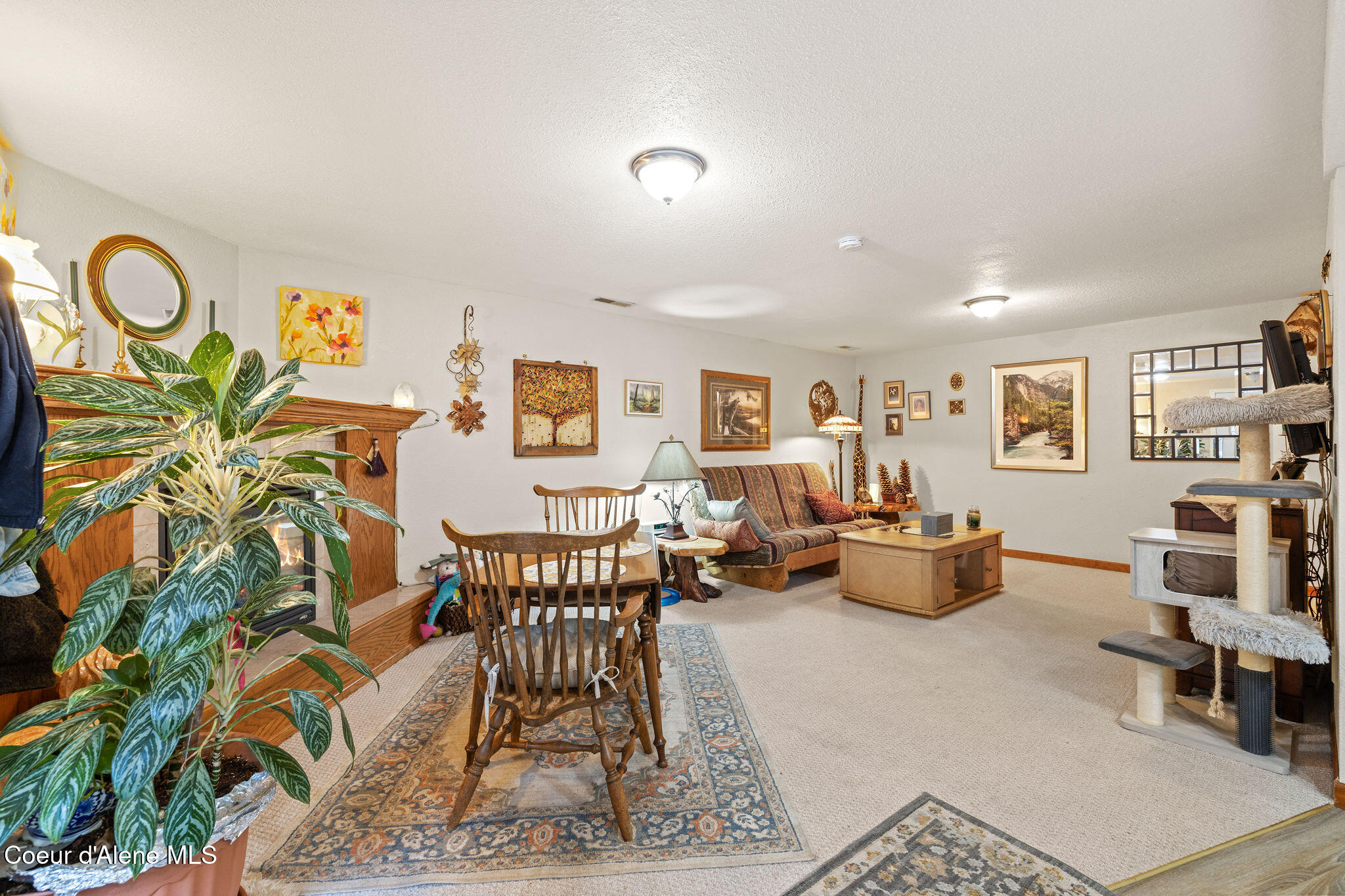 3529 East Mountain View Road Post Falls, ID 83854 - Photo 21 of 32 Gas fireplace downstairs