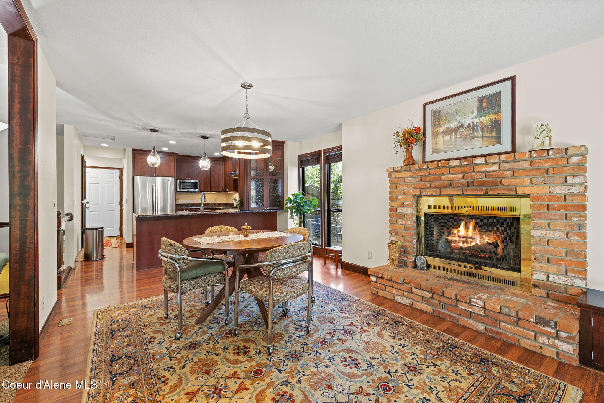 3529 East Mountain View Road Post Falls, ID 83854 - Photo 7 of 32 Wood burning fireplace in dining room