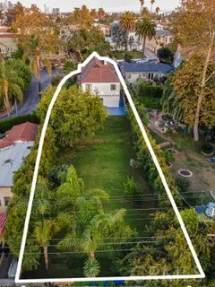 a large kitchen with stainless steel appliances granite countertop a stove and a sink