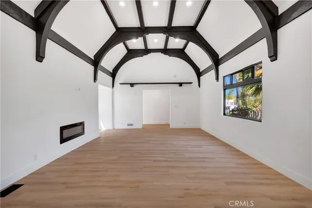 a bathroom with a shower and a glass door